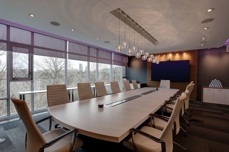 Beige table and chairs in an office meeting room